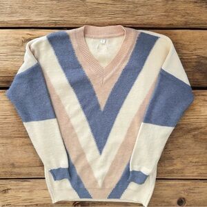 V-Neck Sweater with Blue and Cream Chevron Pattern